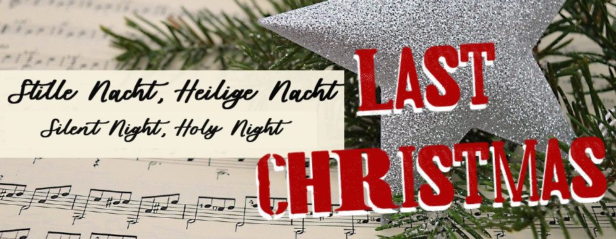 Text: Stille Nacht Heilige Nacht Silent Night Holy Night Last Christmas Christmas ornaments on sheet music
